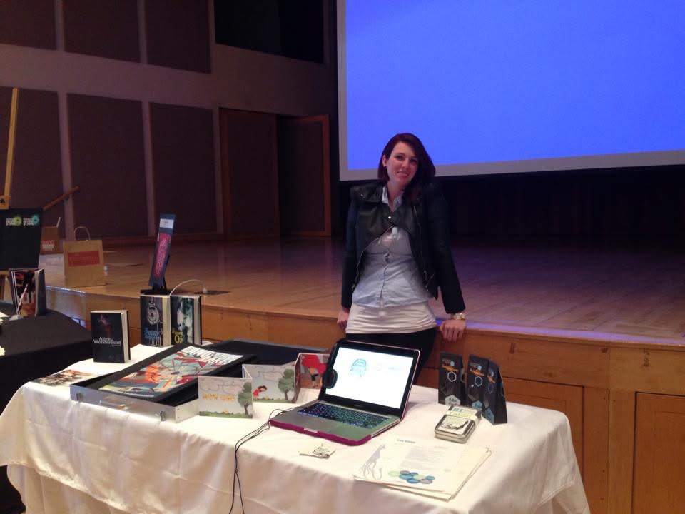 April behind her senior show table of design work.