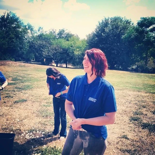 April in an OWC polo at a company picnic in Austin
